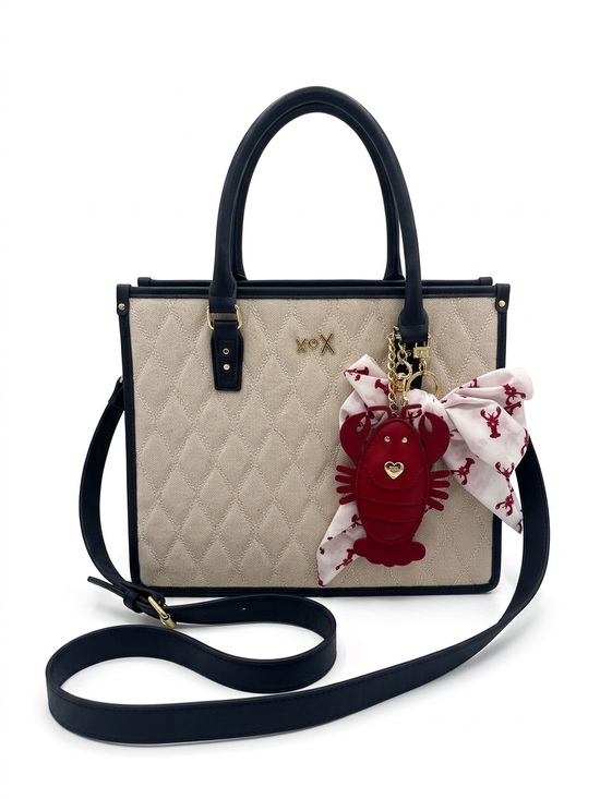 Betsey Johnson Handbags - Betsey Johnson Cream Quilted Tote with Black Trim and Red Lobster Charm